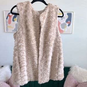 Faux-fur vest.